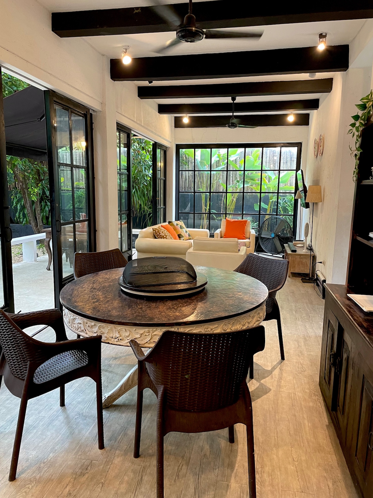 Casa Uno outdoor area with mango trees